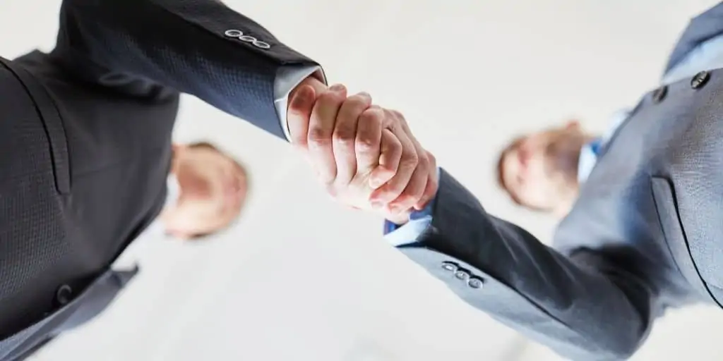 businessmen handshake bottom view